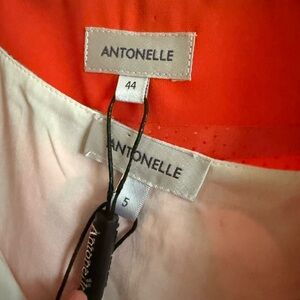 Antonelle White and Orange Top